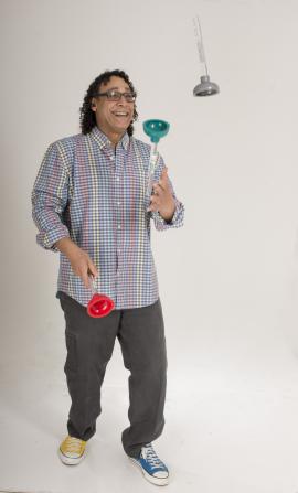 Angel juggling multi-colored plungers