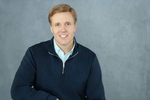 A headshot of Erik Adair
