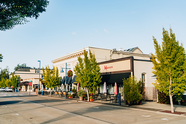 Street view of a small-town street with a restaurant named 