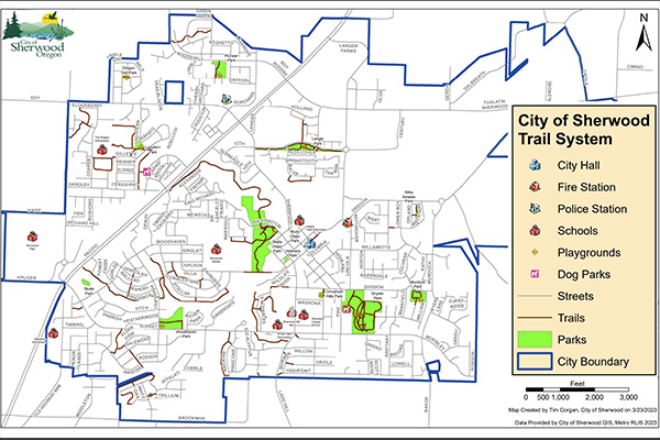 Map of the City of Sherwood Trail System showing city boundaries, streets, trails, parks, playgrounds, dog parks, schools, and locations of city services.