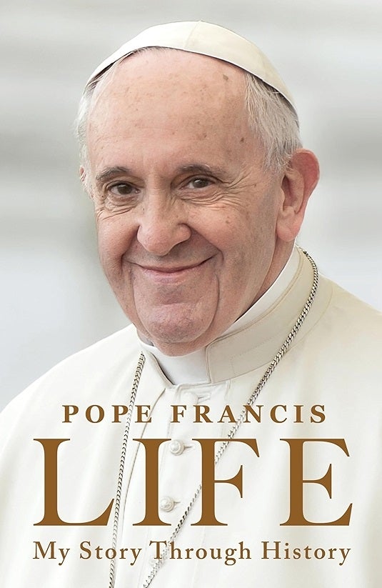 Cover of the book "Life: My Story Through History" by Pope Francis, featuring a portrait of Pope Francis smiling and wearing white papal attire.