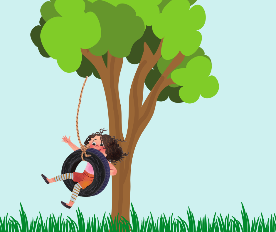 A child with curly hair swings on a tire swing hanging from a tree branch, surrounded by green grass.