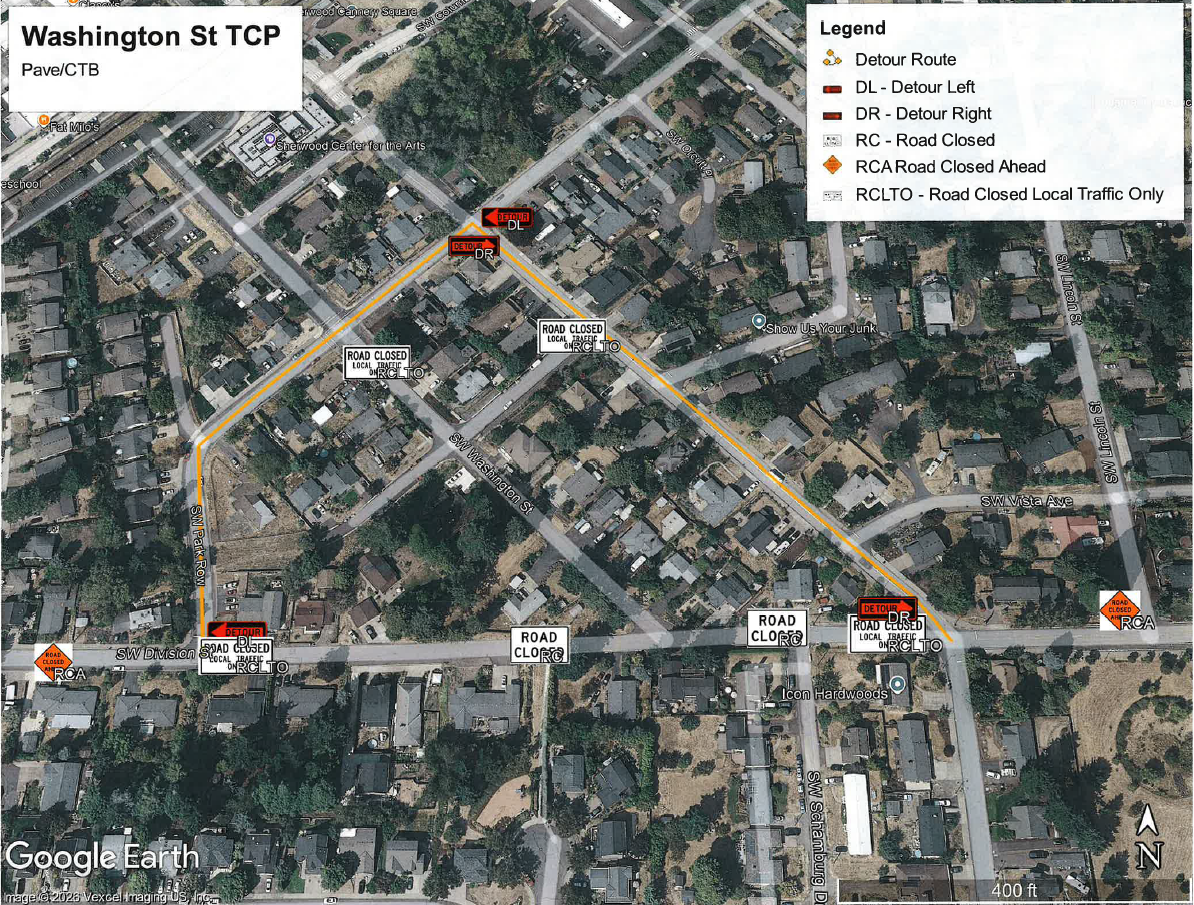Aerial map of a neighborhood showing a detour route for Washington St, with road closure signs and a legend explaining route symbols.